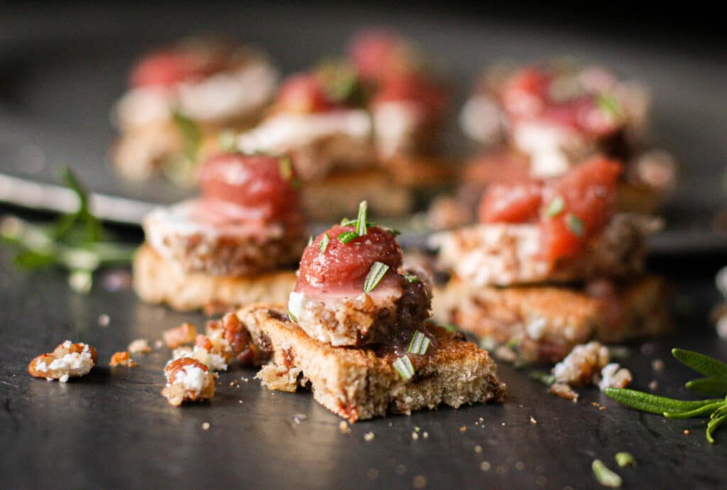 Pecan-Crusted Goat Cheese Toasts with Red Grapes