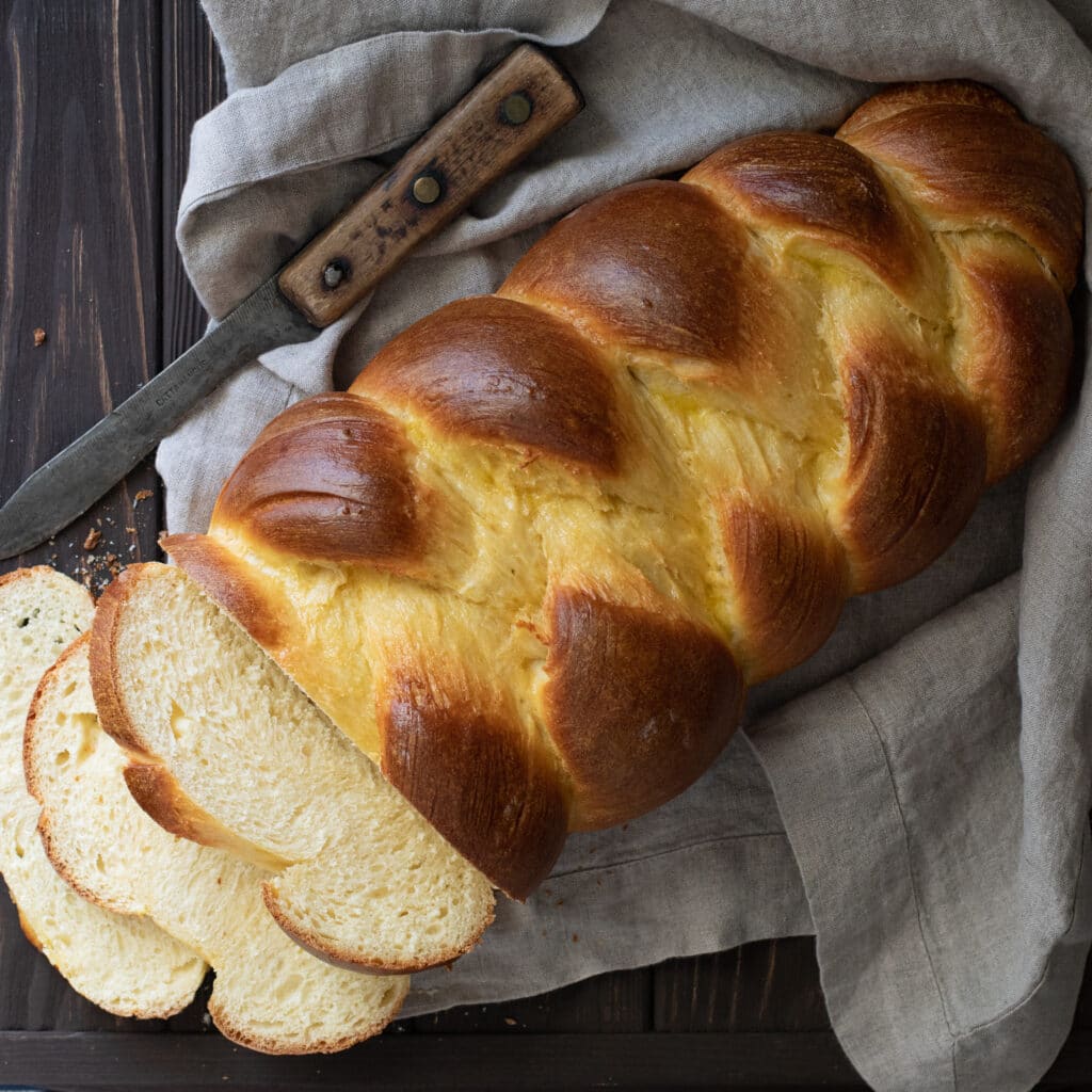 Homemade Challah Bread partially sliced