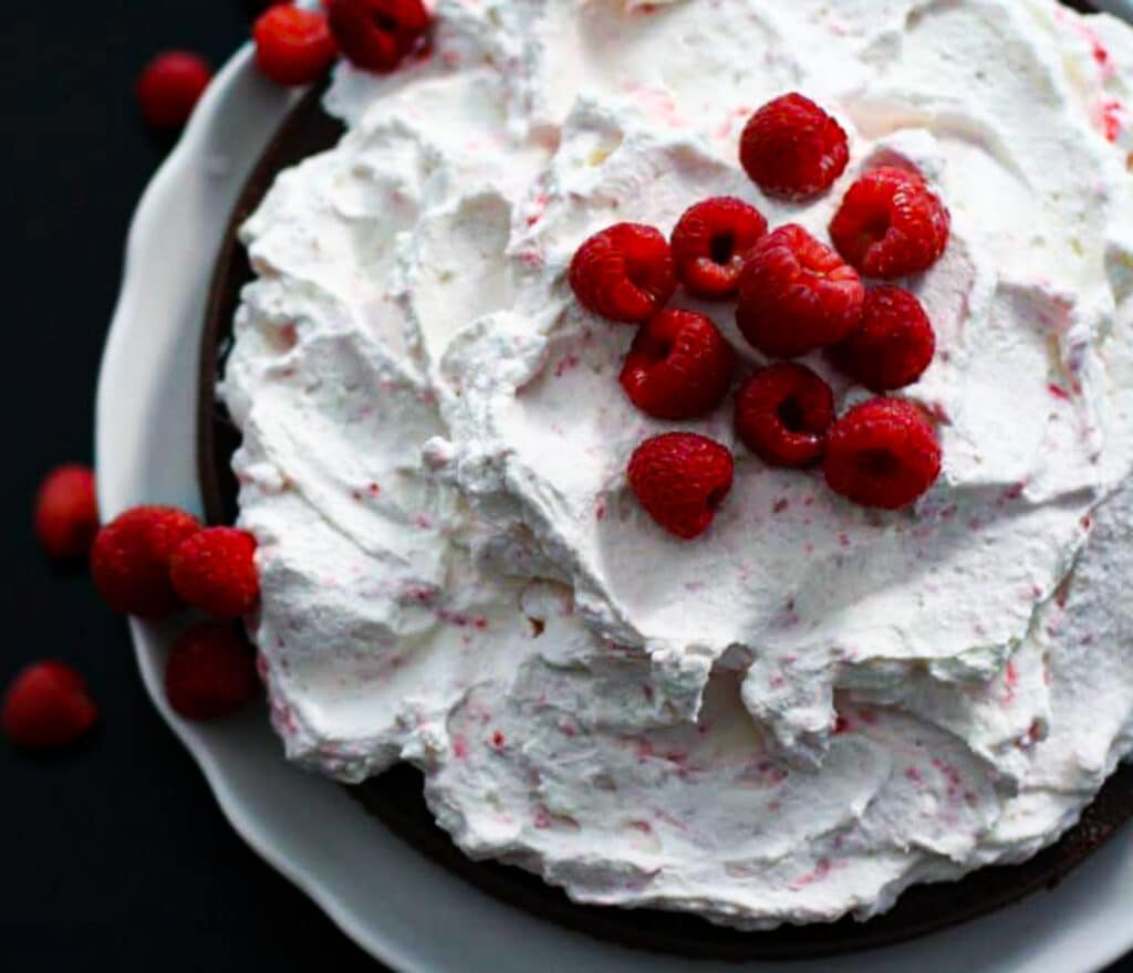 Flourless Chocolate Cake with Raspberry Swirled Cream