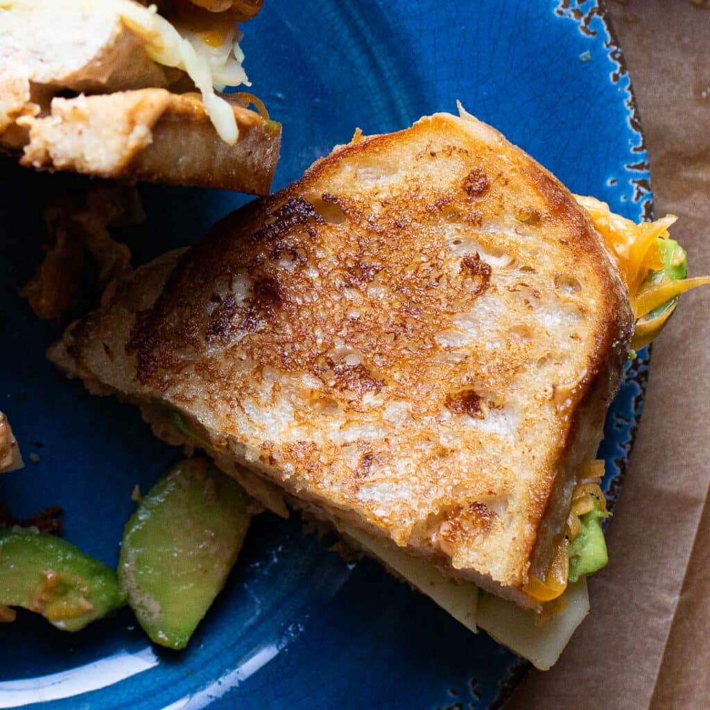 Top view of half of a chipotle chicken melt with avocado