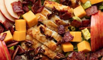 autumn harvest salad with apples, chicken, bacon and cubed cheddar cheese