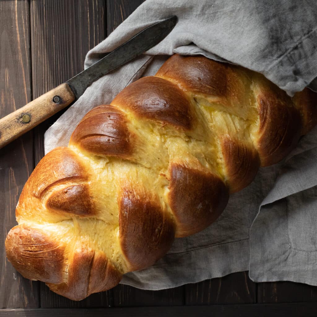 a loaf of braided challah bread