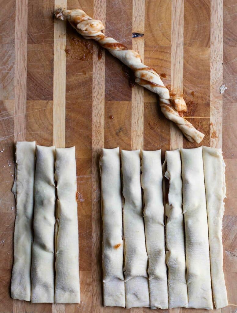 Unbaked puff pastry twists