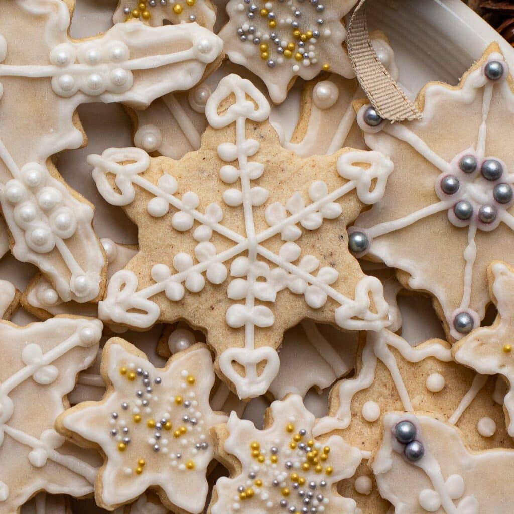 An eggnog snowflake cookie with rum frosting
