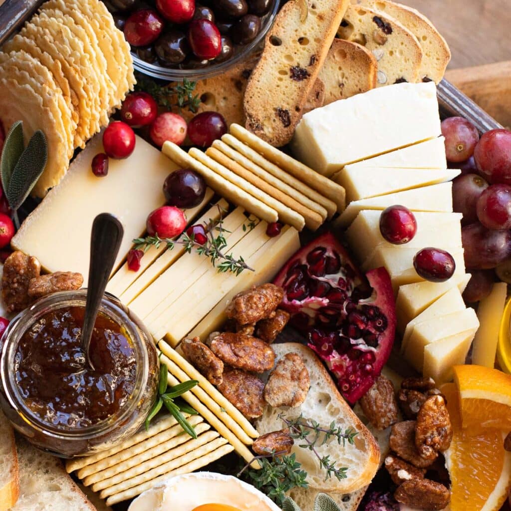 Cheese, cranberries, pomegranates and fig jam