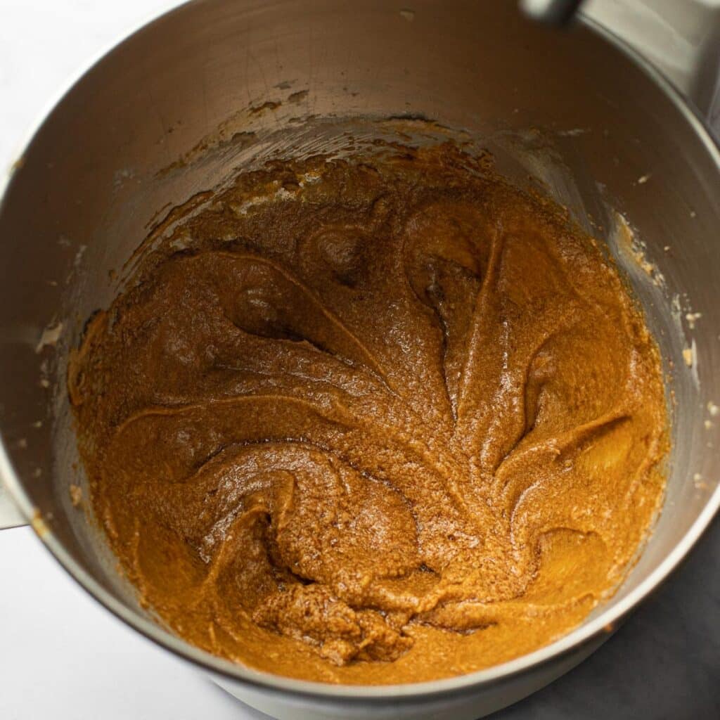 Gingerbread cookie batter in a mixing bowl