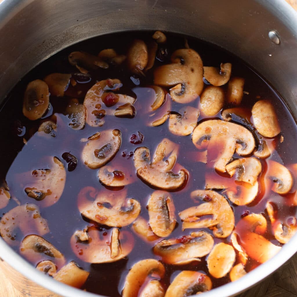 Sweet and Sour Sauce with slicd mushrooms