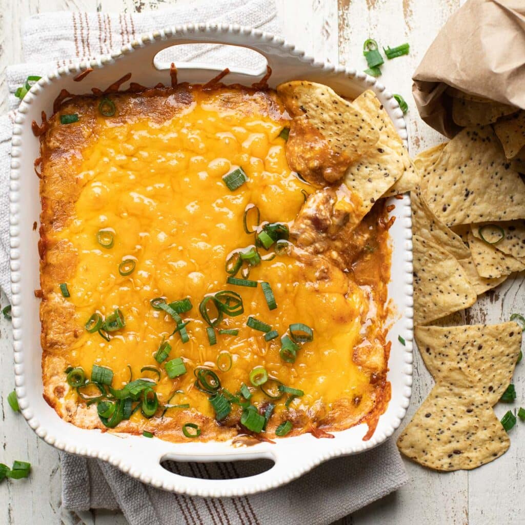 Chili Cheese Dip in a white square baking dish