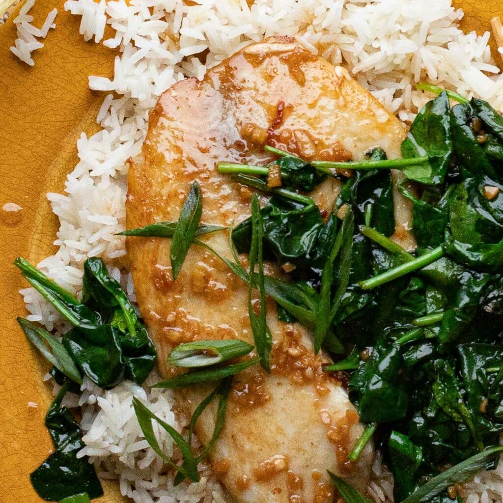 tilapia with ginger garlic sauce and spinach
