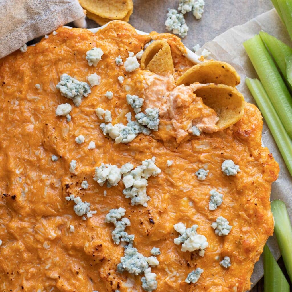 Buffalo Chicken Dip with blue cheese crumbles on top