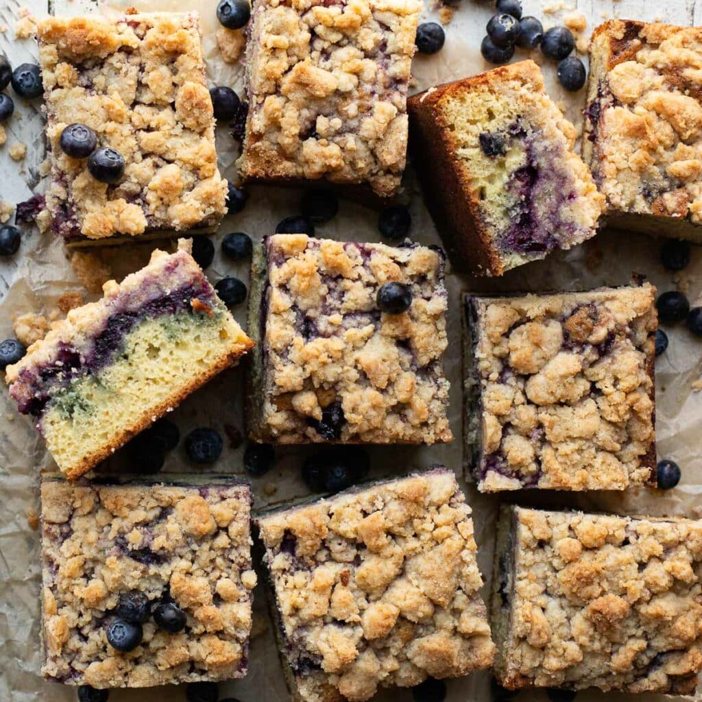 Square pieces of blueberry crumb cake