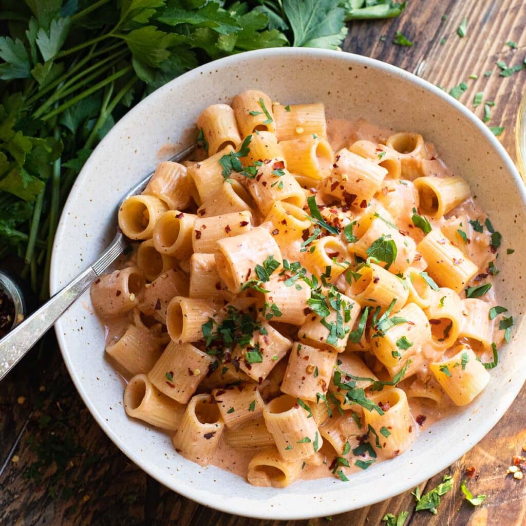 Rigatoni with blush sauce in a large bowl