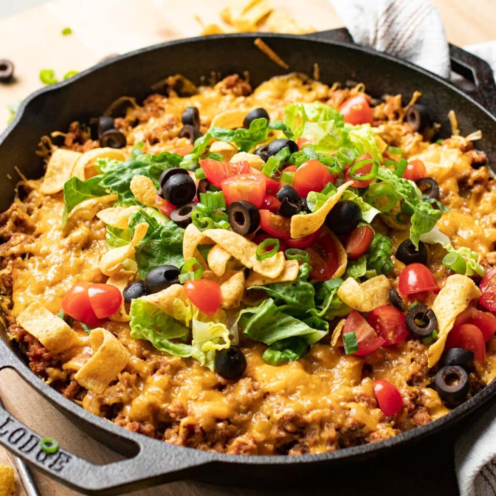 taco bake with Fritos, tomatoes and lettuce