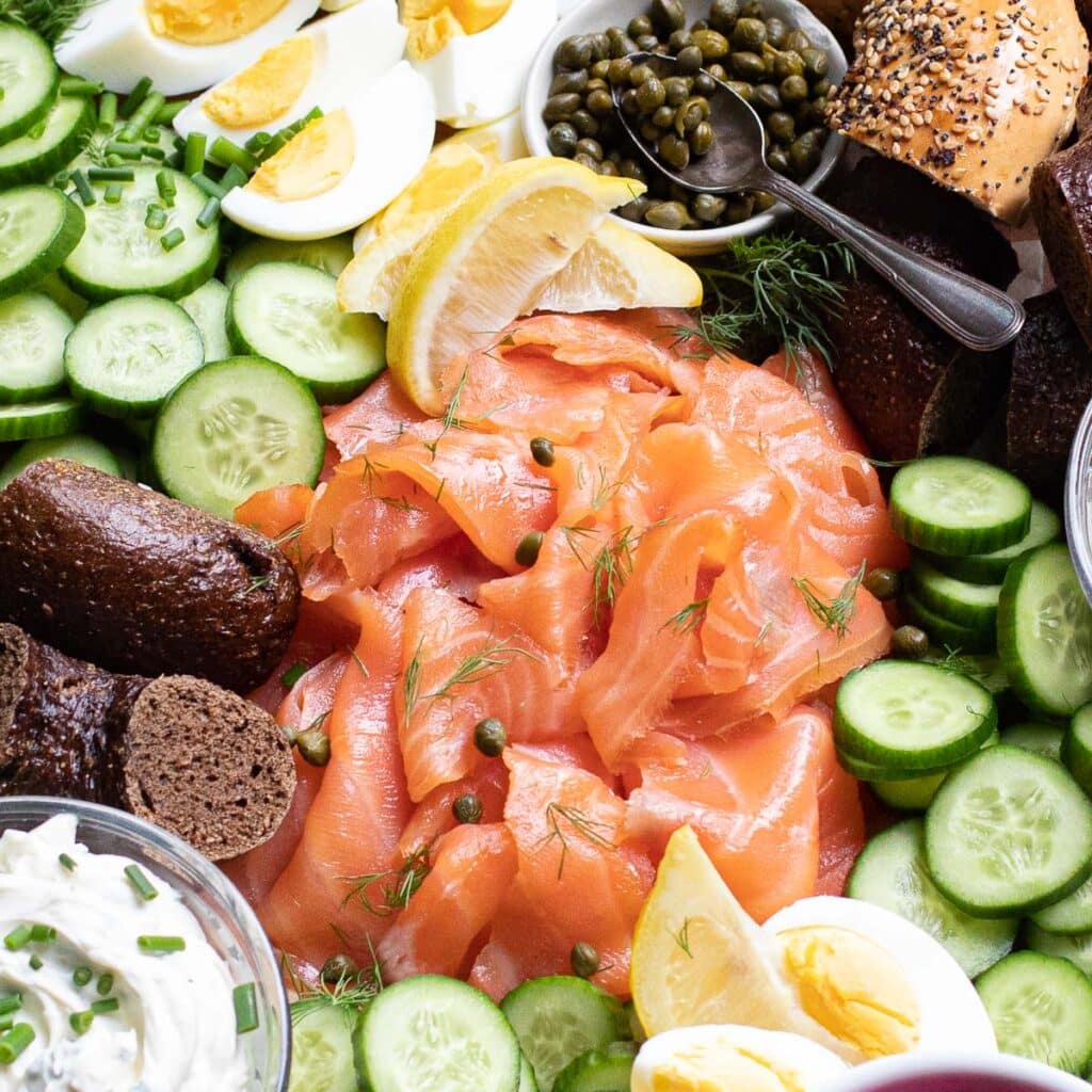 smoked salmon, bagels, cucumber rounds, capers and hardboiled eggs