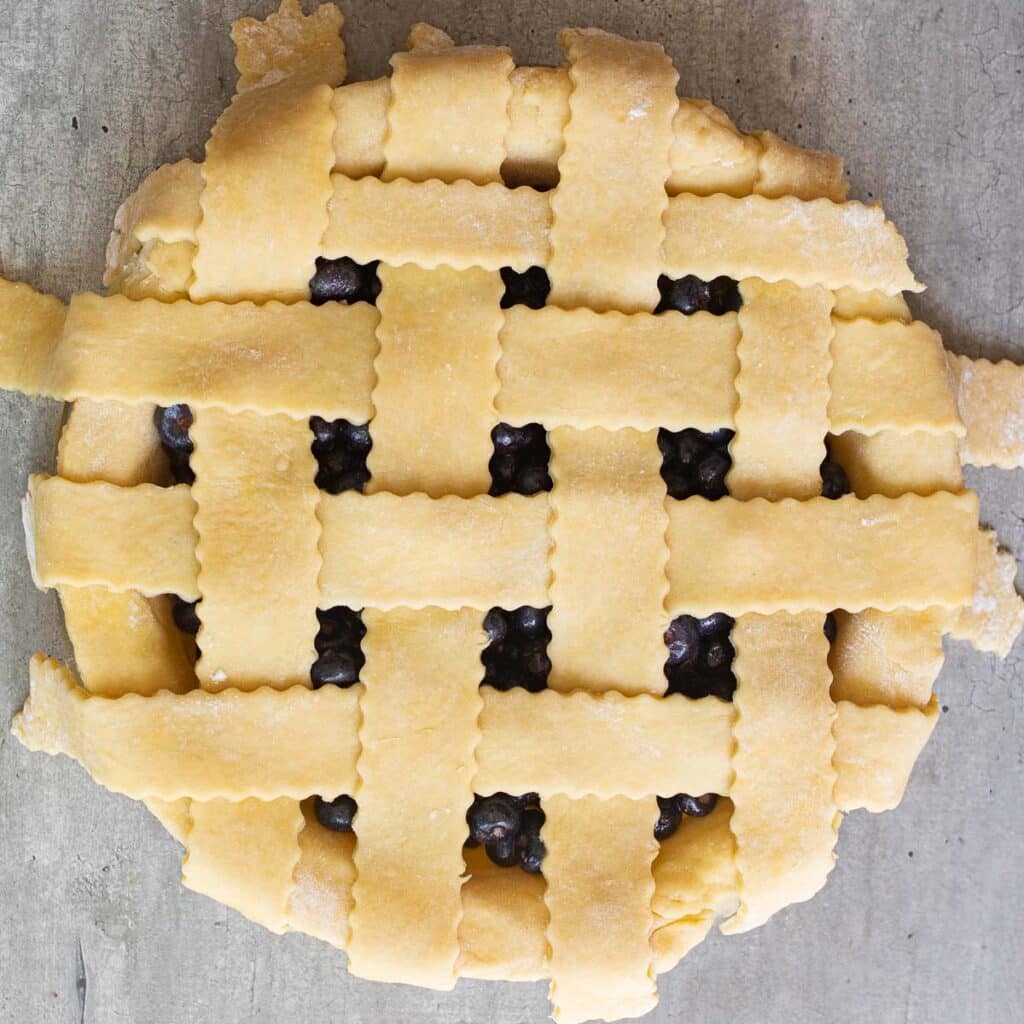 unbaked blueberry pie with lattice top