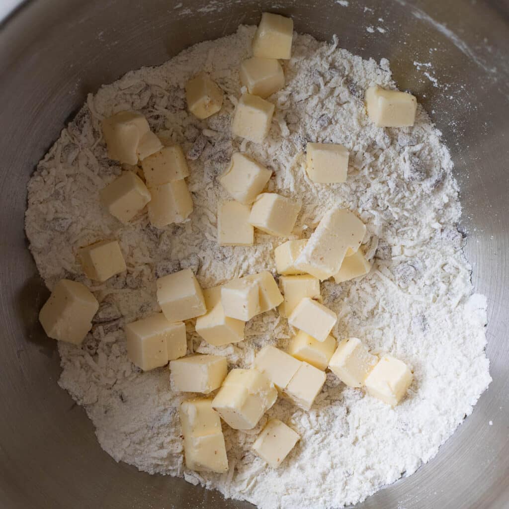cubes of butter and flour in a mixing bowl