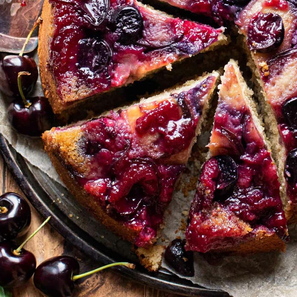top down view of 3 slices of cherry upside down cake