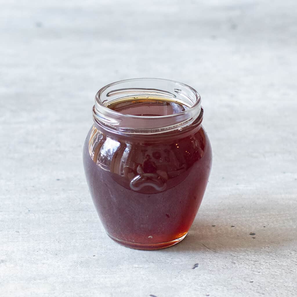 homemade chai syrup in a glass jar