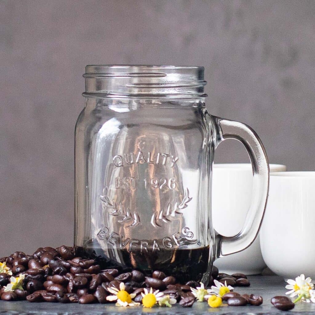 espresso in a glass mason jar