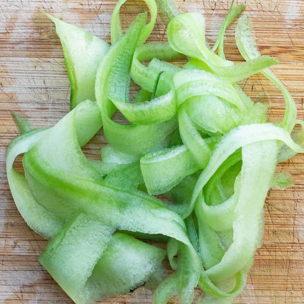 thin ribbons of cucumber
