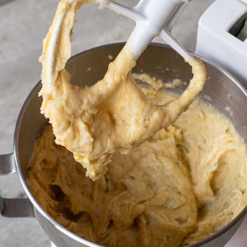 choux pastry dough in a stand mixer
