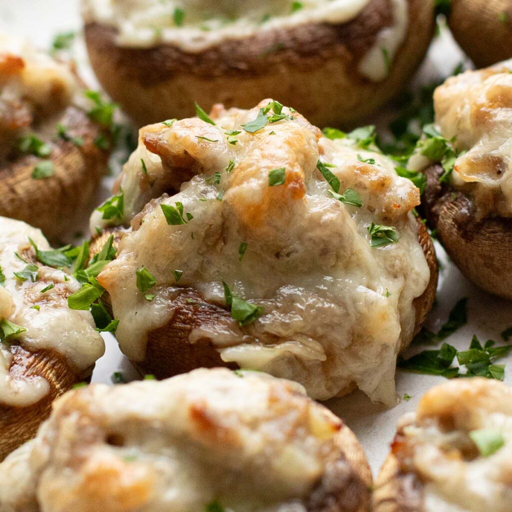 sausage stuffed mushroom with melted cheese on top