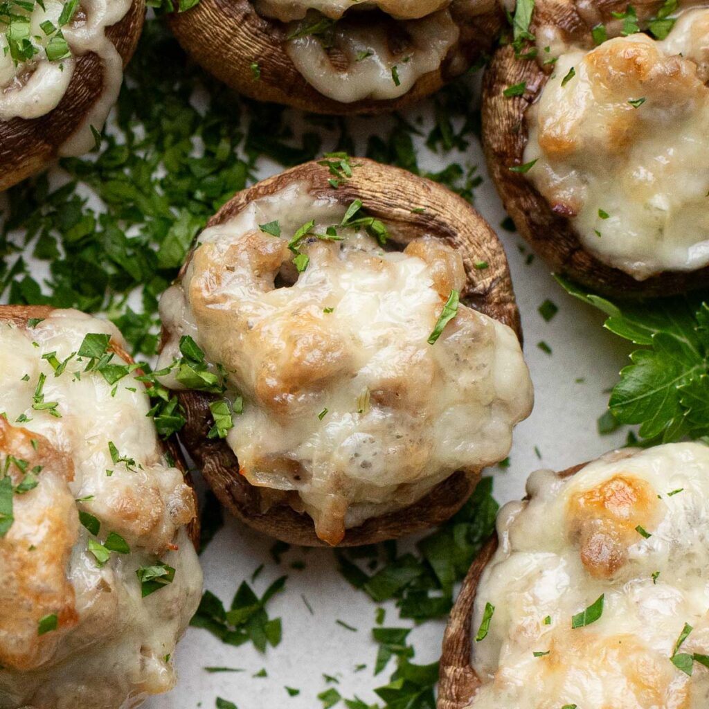 sausage stuffed mushrooms with melted cheese