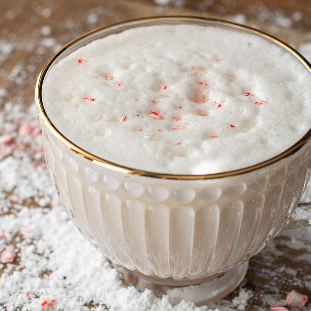 white hot chocolate in a glass mug