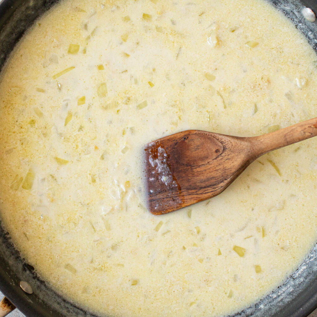 coconut curry sauce cooking in a pan