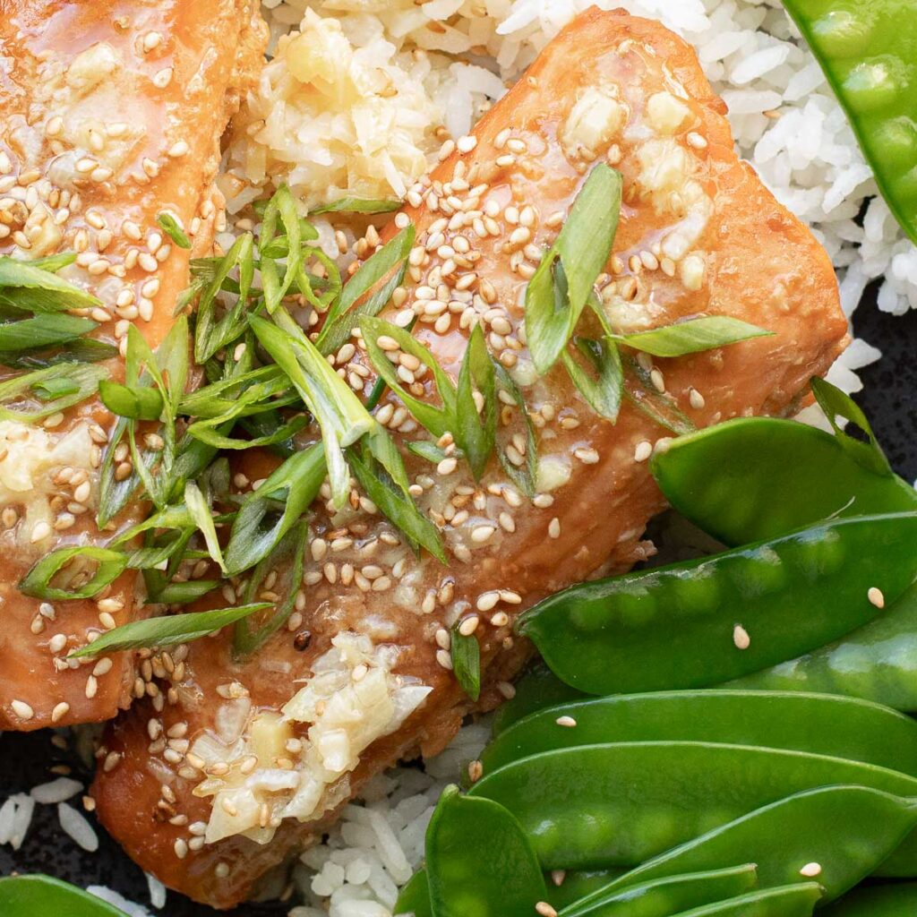 cheesecake factory miso salmon topped with chopped scallions and sesame seeds
