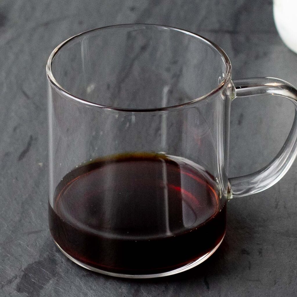 black coffee in a glass mug