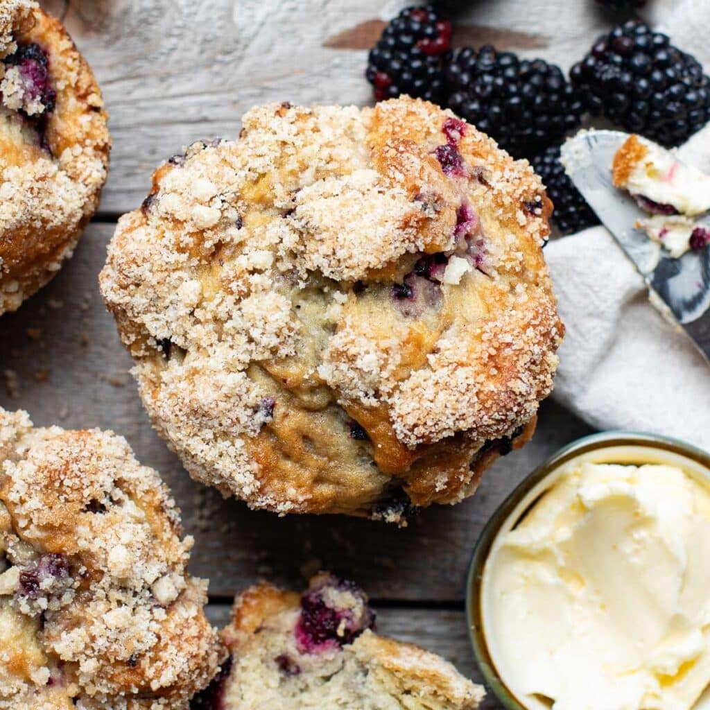 overhead view of a gluten free blackberry muffin with streusel topping