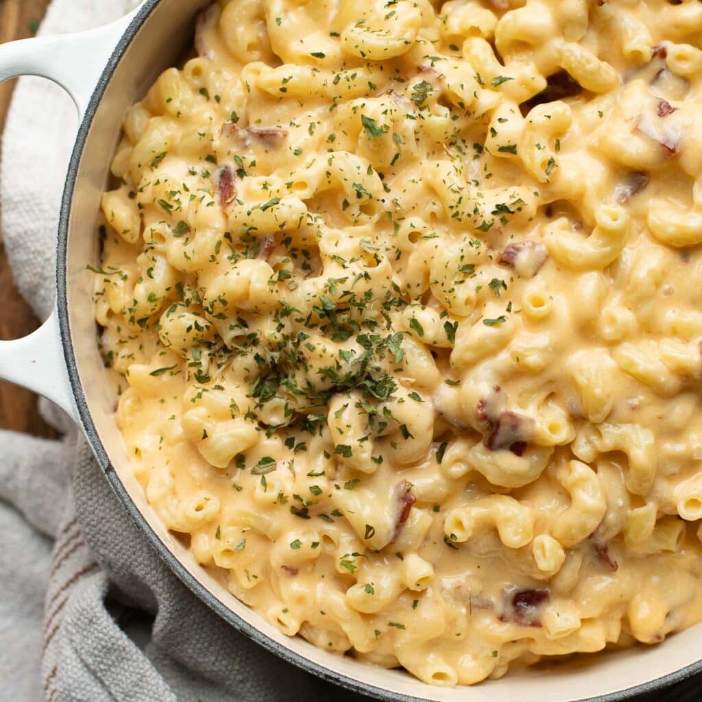 gouda mac and cheese topped with chopped parsley
