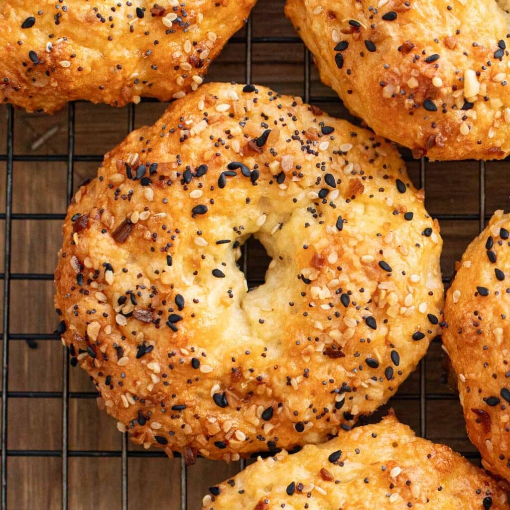 a cottage cheese everything bagel on a wire rack