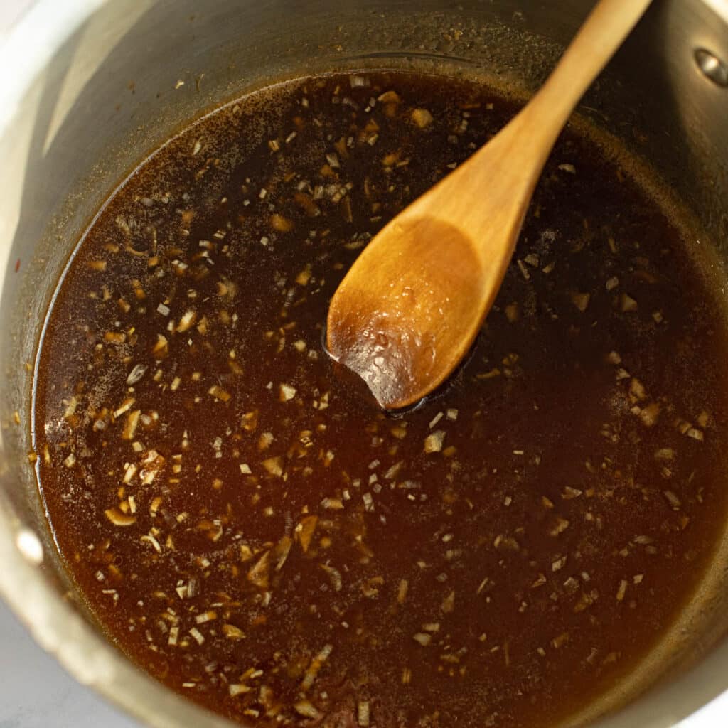 honey butter sauce cooking in a pan