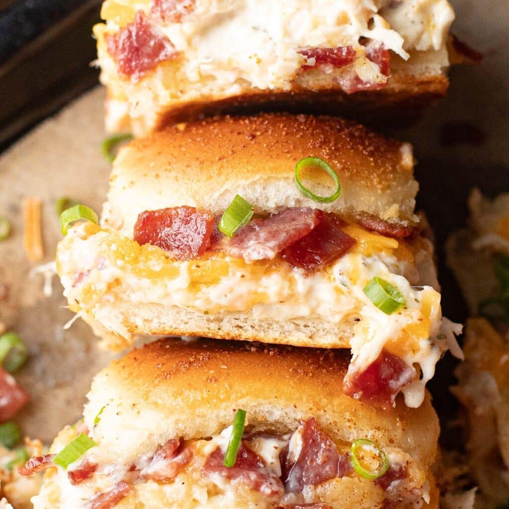 three chicken bacon ranch sliders stacked on each other