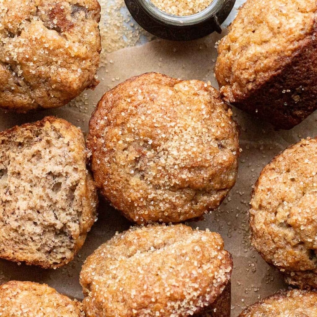 gluten free banana bread muffins topped with coarse sugar