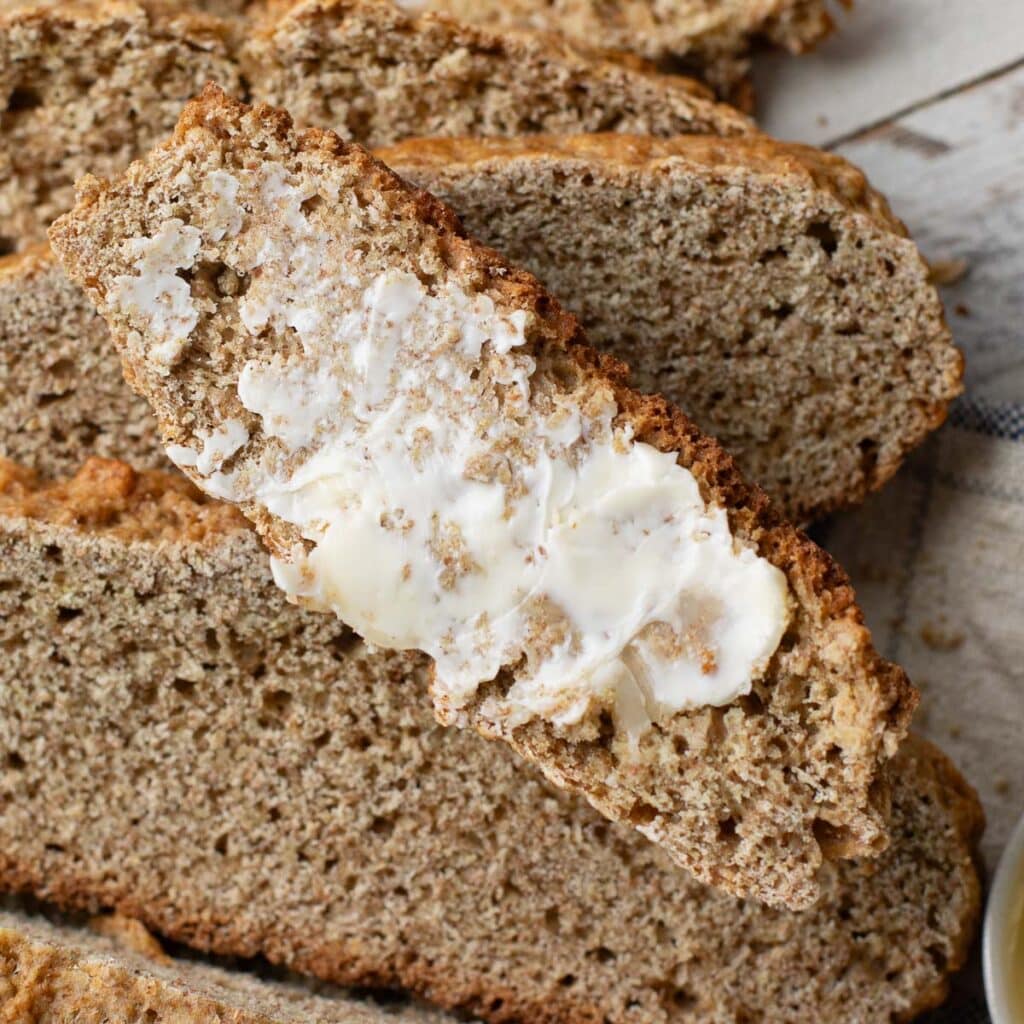 a slice of Irish brown soda bread smeared with butter