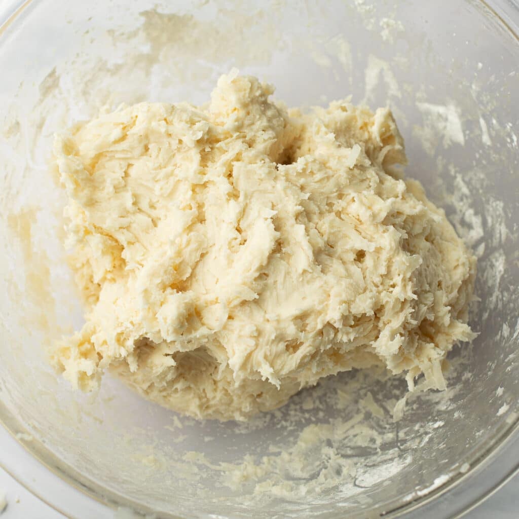 coconut cream fondant in a glass mixing bowl