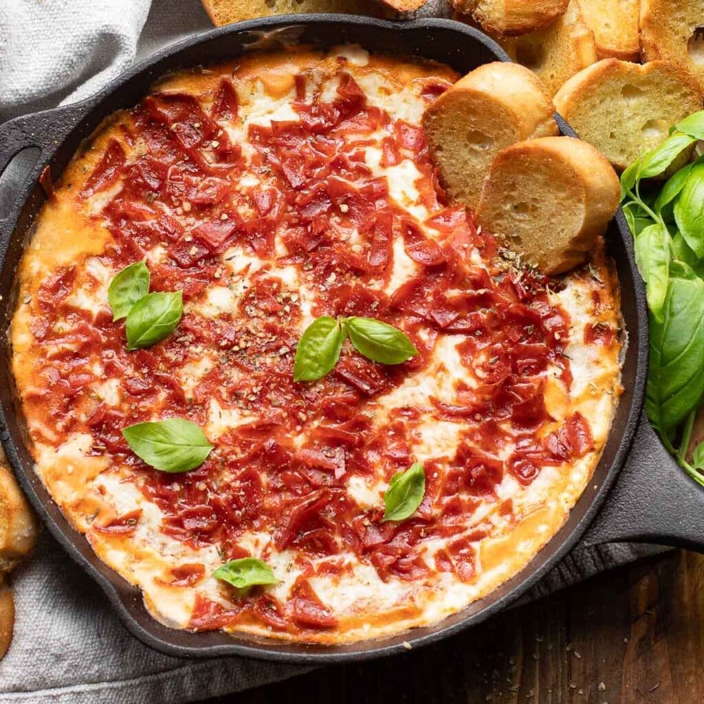 pizza dip in a cast iron skillet