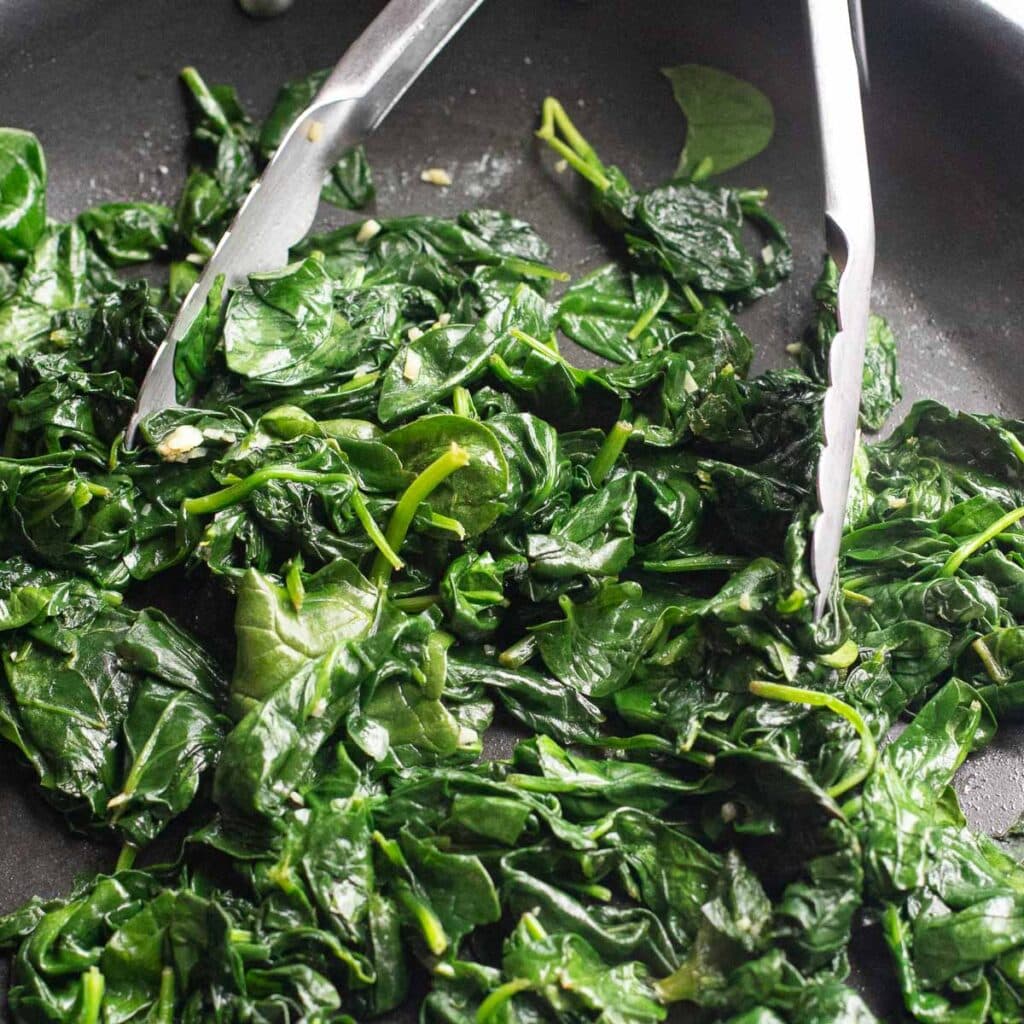 sauteed spinach in a pan