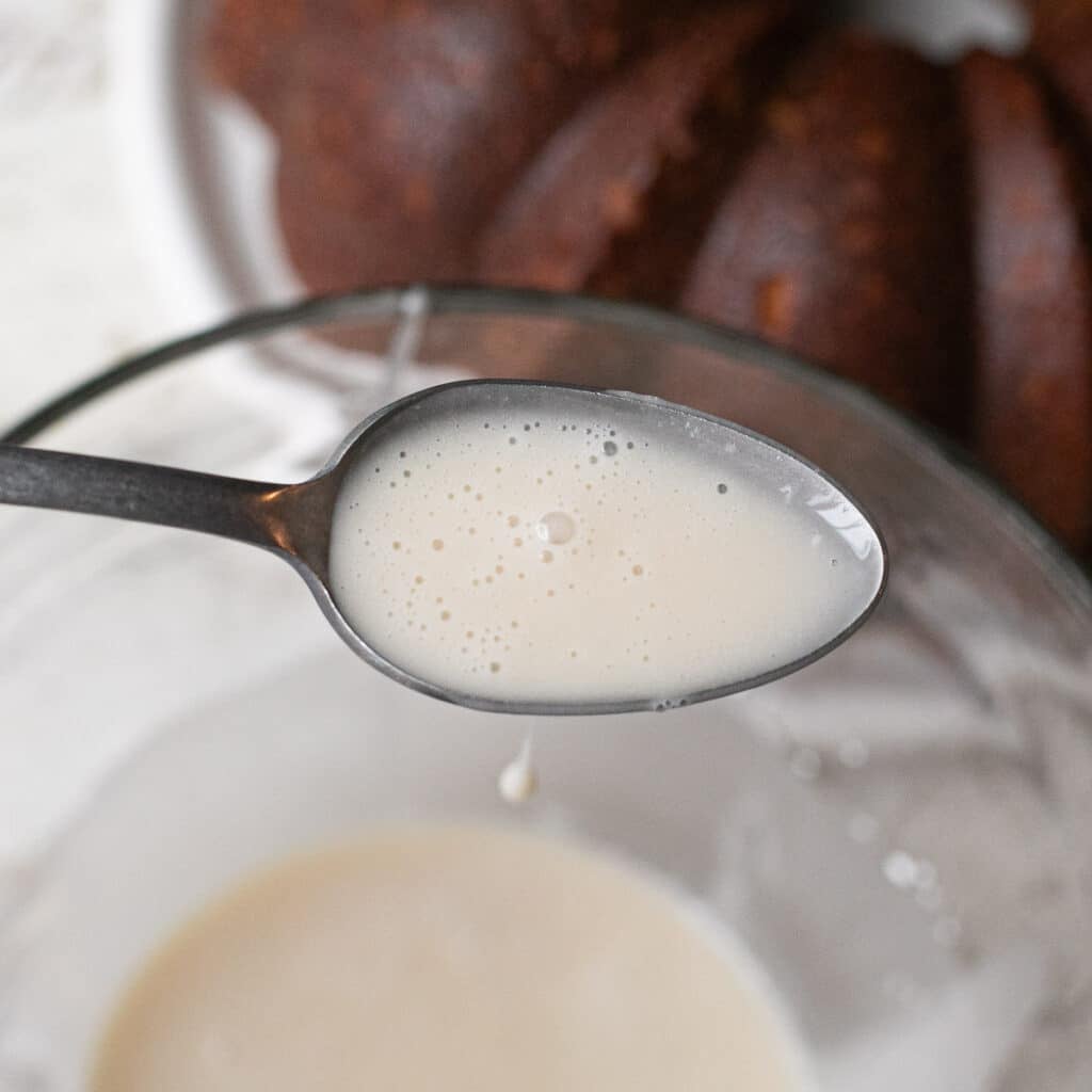 maple glaze in a silver spoon