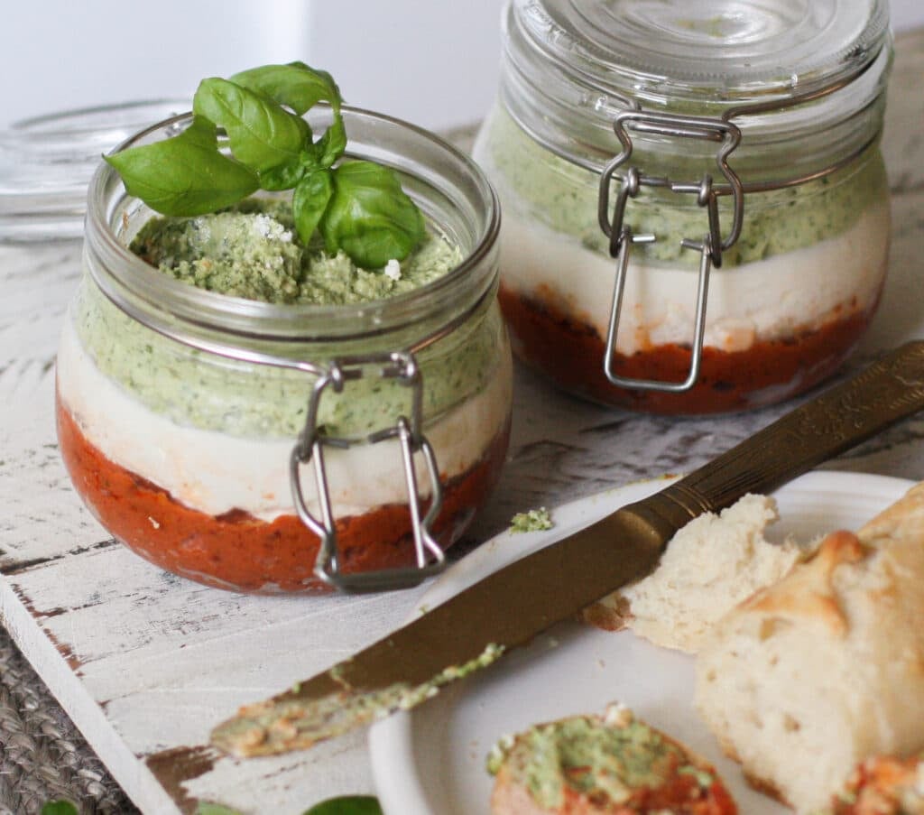 layered torte with cream cheese, sun dried tomatoes and pesto 