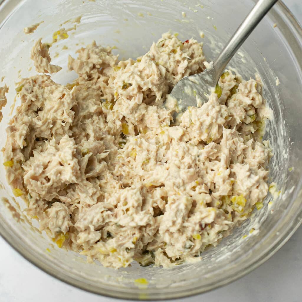 tuna salad in a glass mixing bowl