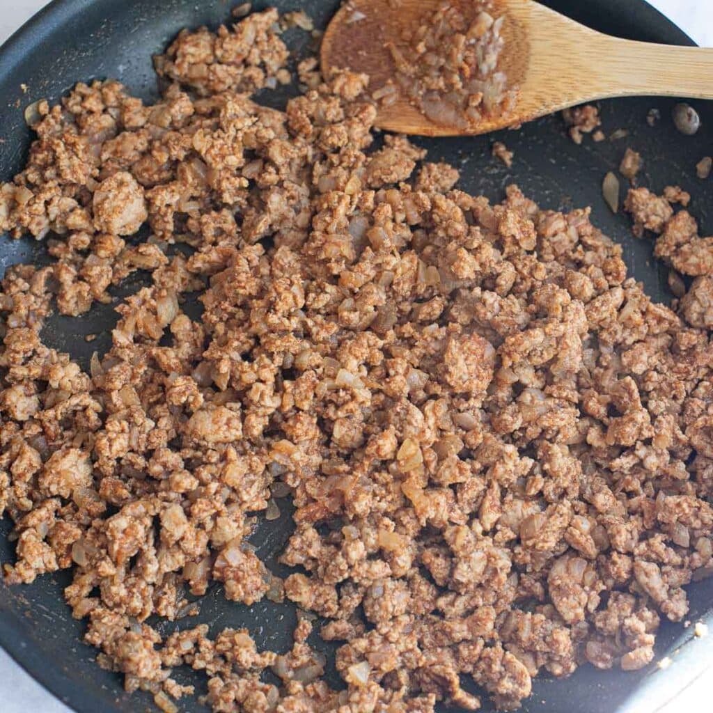 ground turkey cooking in a pan
