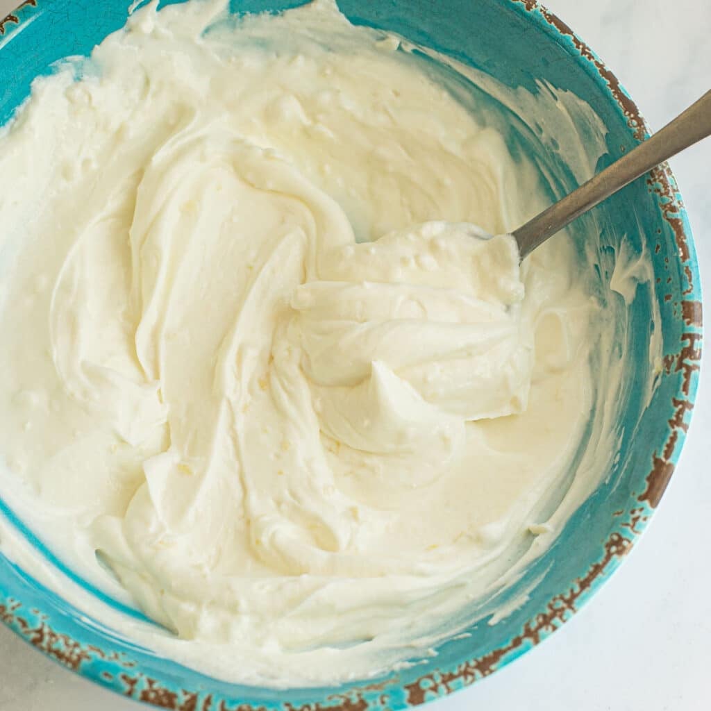 yogurt sauce in a blue bowl
