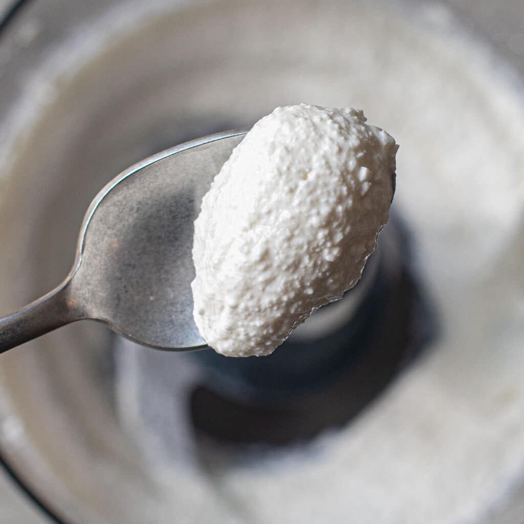 whipped cottage cheese on a silver spoon