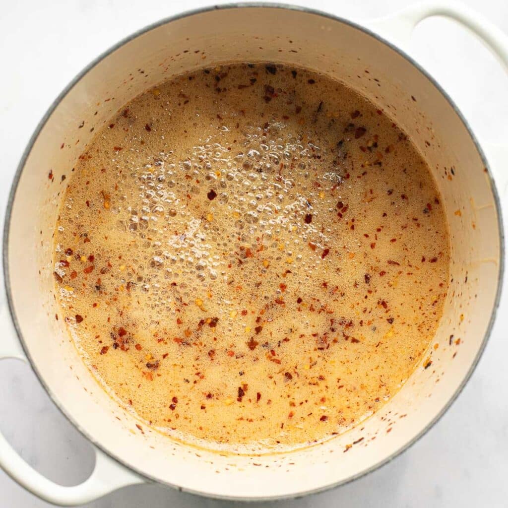 hot honey simmering in a saucepan