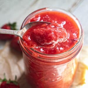 strawberry sauce on a silver spoon