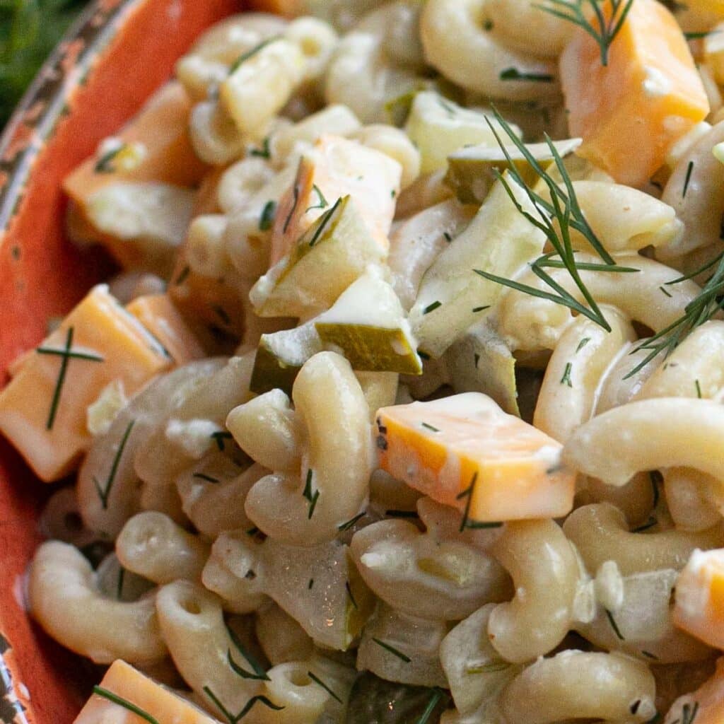 close up view of dill pickle macaroni salad
